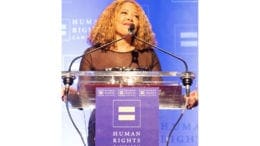 Rep. Lucy McBath speaking at Human Rights Campaign gala (photo by Martel Sharpe)