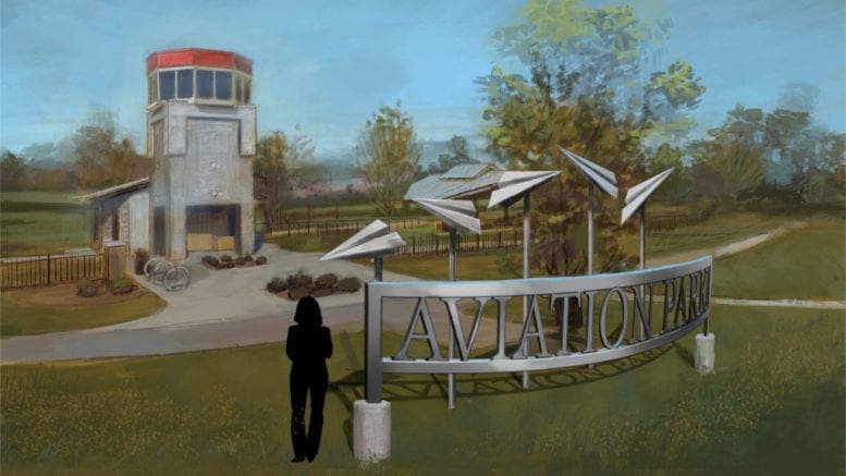 Aviation Park signage design by KSU student. A silver sculpture spelling out "Aviation Park" topped with metal depictions of paper airplanes