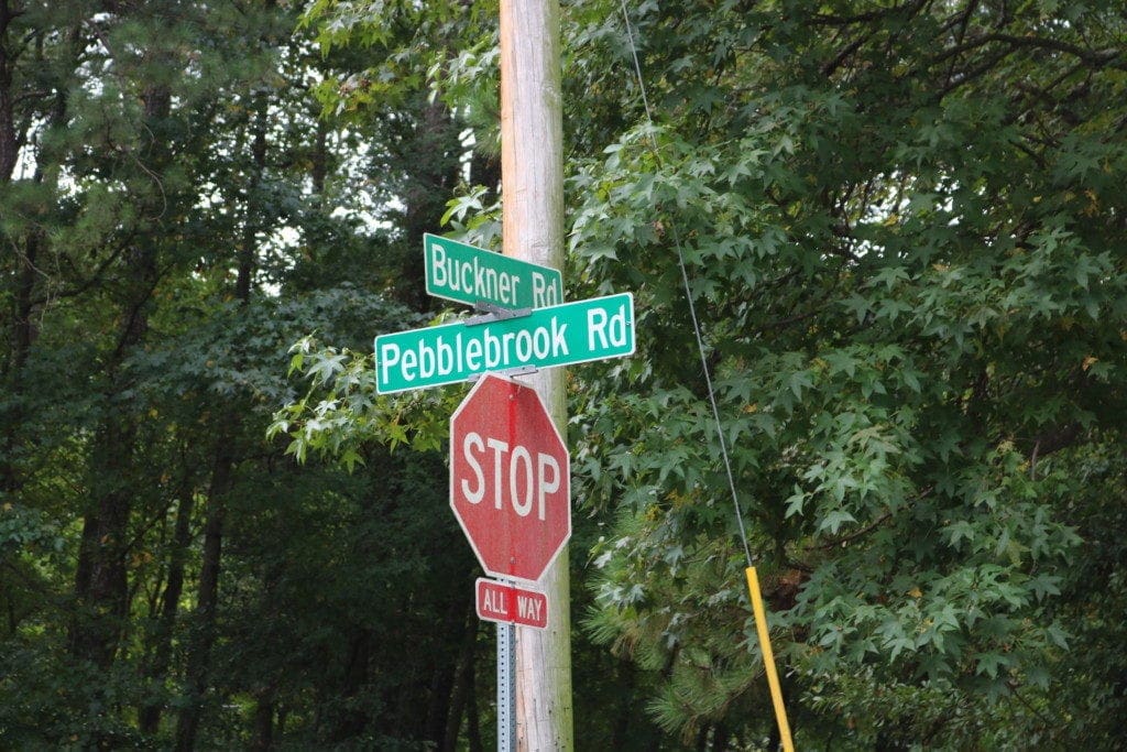 Road sign at Pebblebrook and Buckner Roads