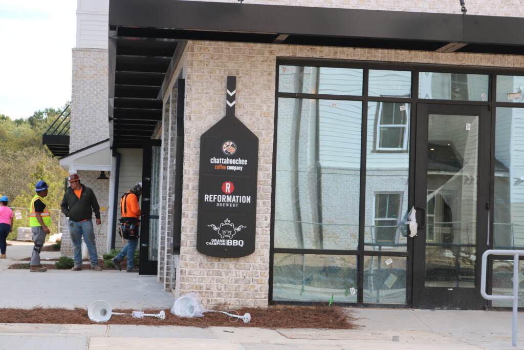signage for the restaurants and coffee shop at Riverview Landing