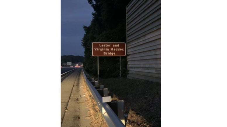 Photo of sign reading "Lester and Virginia Maddox Bridge"