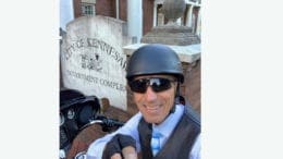 Ciy Hall Selfie Day image of a man in a helmet in front of Kennesaw City Hall