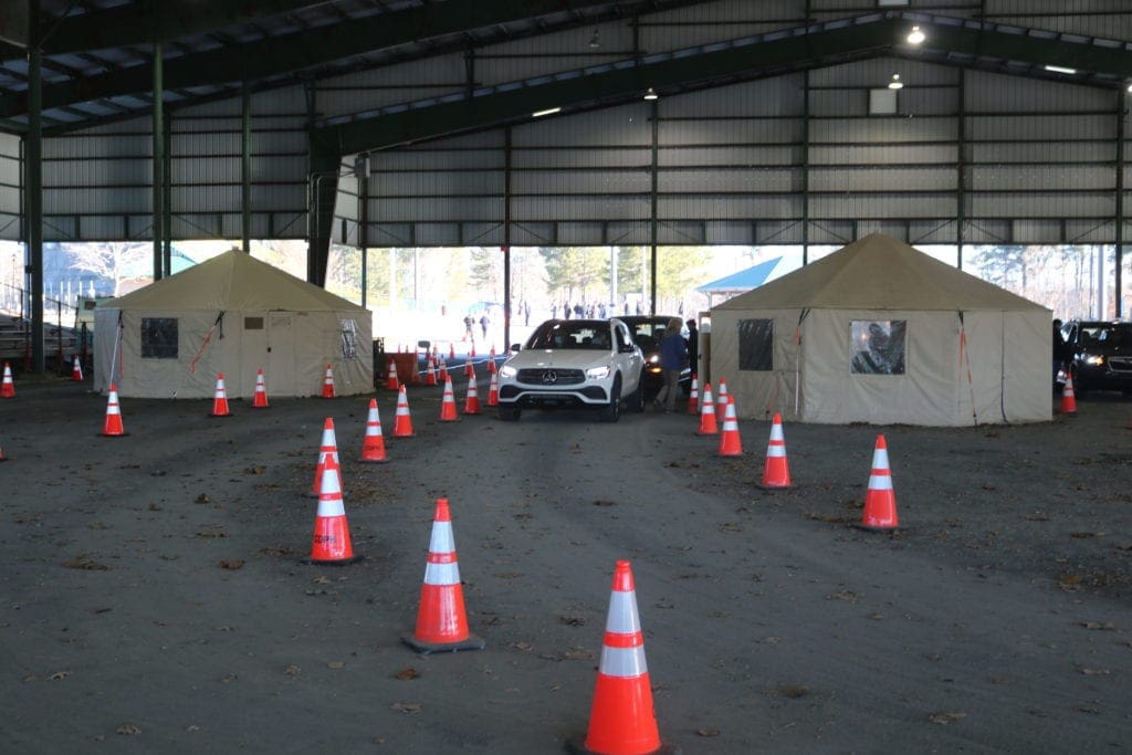 cars lined up at vaccination site