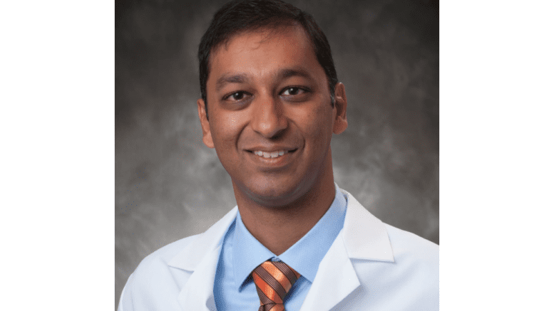 Dr. Rishi Gupta in medical jacket