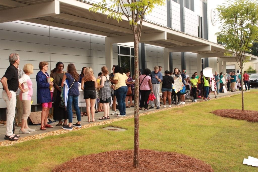 line outside school board meeting