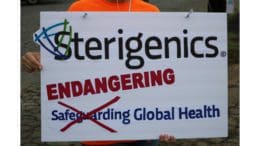 a sign stating "Sterigenics, endangering global health)