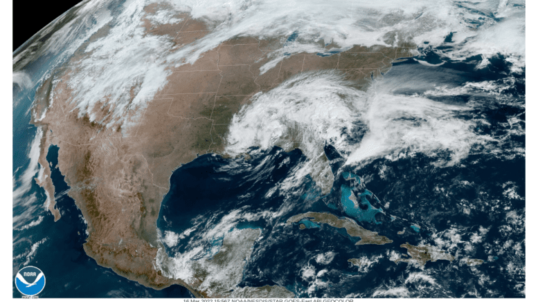 Satellite map of eastern United States showing a swirling mass of clouds