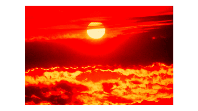 a photo of the sun in bright red