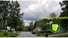 Cobb weather February 23: Photo of cloudy skies above a residential street