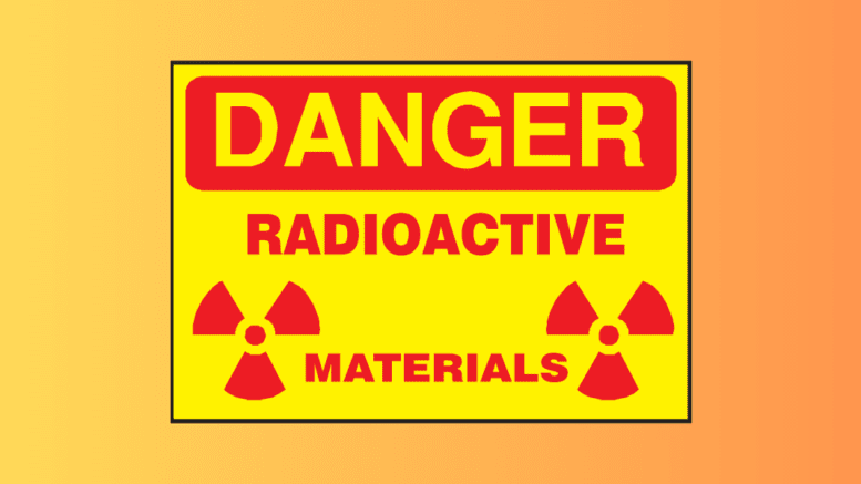 A sign with the radial triangle signifying radioactivity and the text "Danger Radioactive Materials"