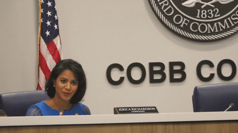 Commissioner Jerica Richardson seated in Cobb BOC