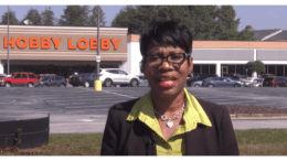 Commissioner Monique Sheffield in front of Hobby Lobby