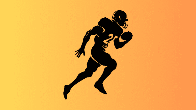 Silhouette of a football player running with the ball