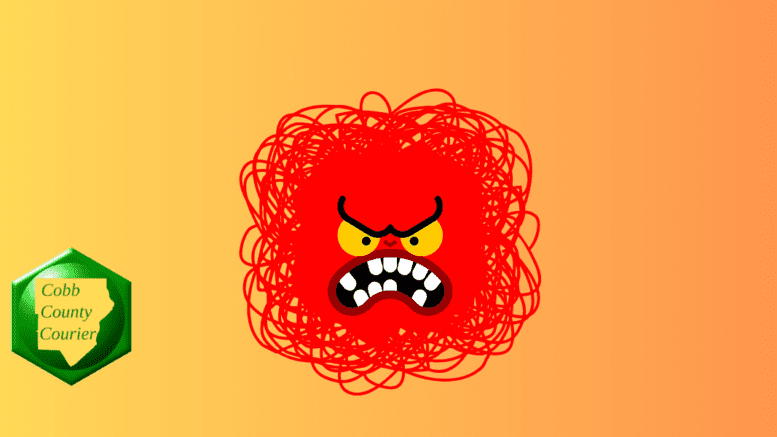 An angry face in a red tangled swirl