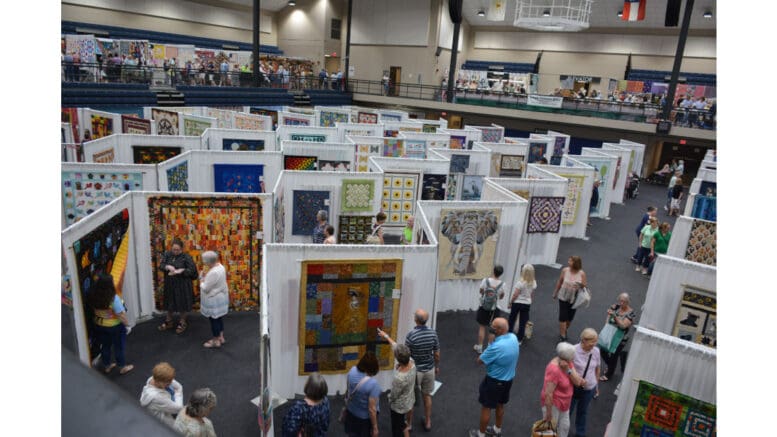 An exhibit hall full of quilts