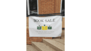 A sign for the Friends of Smyrna Library Summer Book Sale